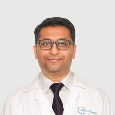 Dr. Madan Maitre