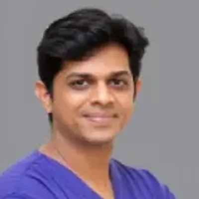 Dr. Suman M B